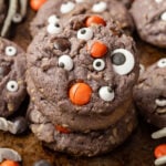 Halloween Monster Cookies on a medal background with skeleton hands, and Halloween M&M