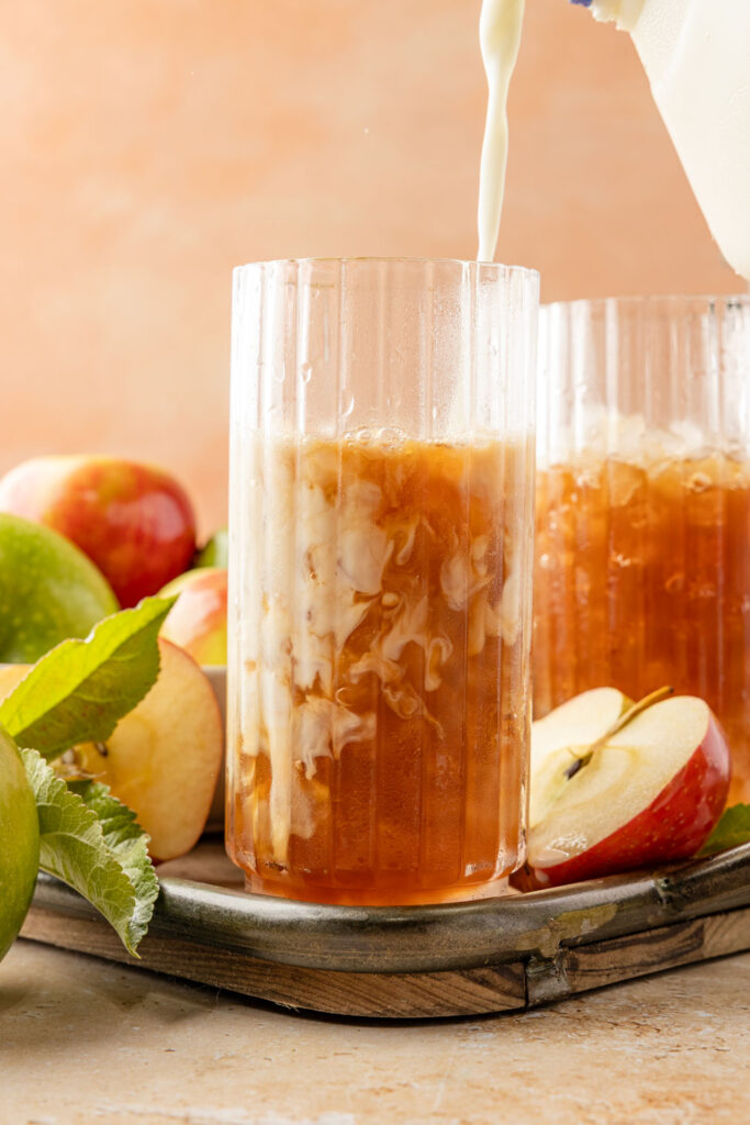 Chai and milk in a glass with ice