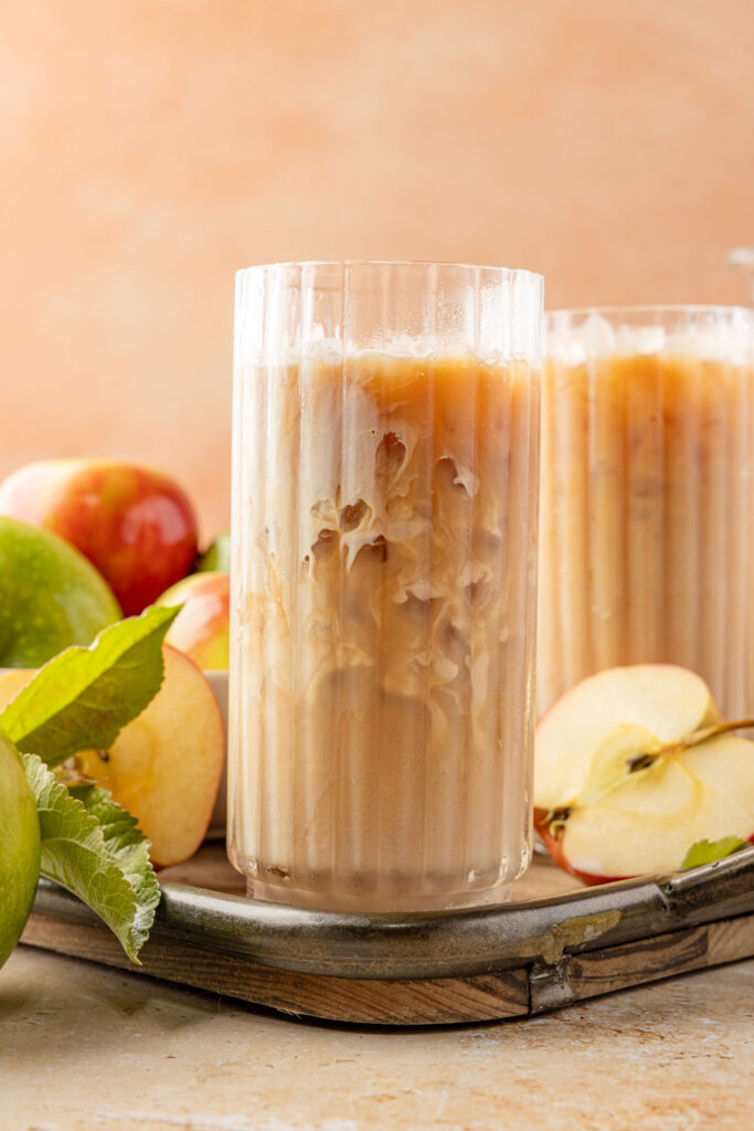 Chai and milk in a glass with ice