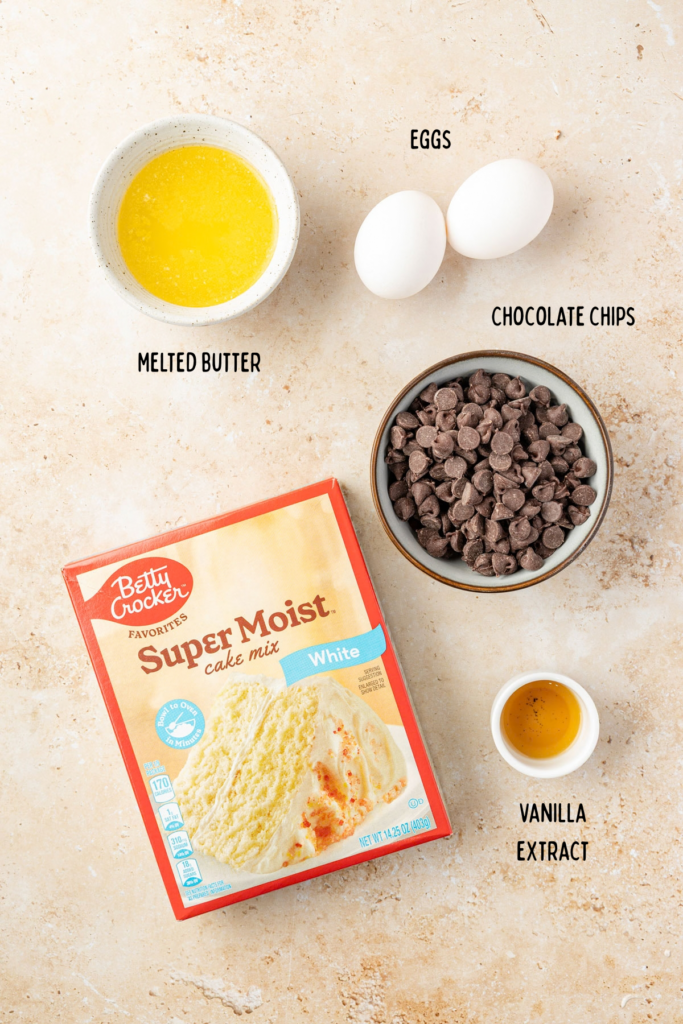 Ingredients for Cake Mix Cookie Bars in mixing bowls.