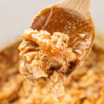 Close-up of tender Slow Cooker Teriyaki Chicken coated in homemade teriyaki sauce.